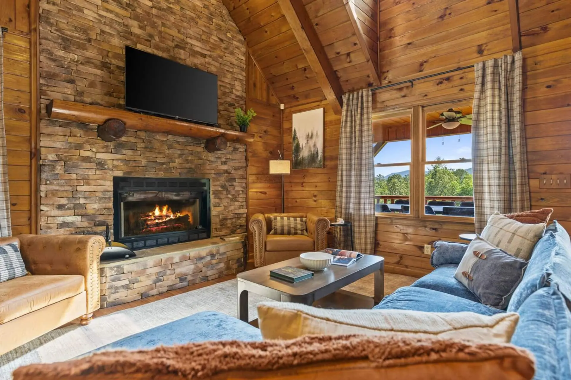 Cozy up by the stunning stone fireplace, the heart of the living room and perfect for relaxing after a day of adventure!