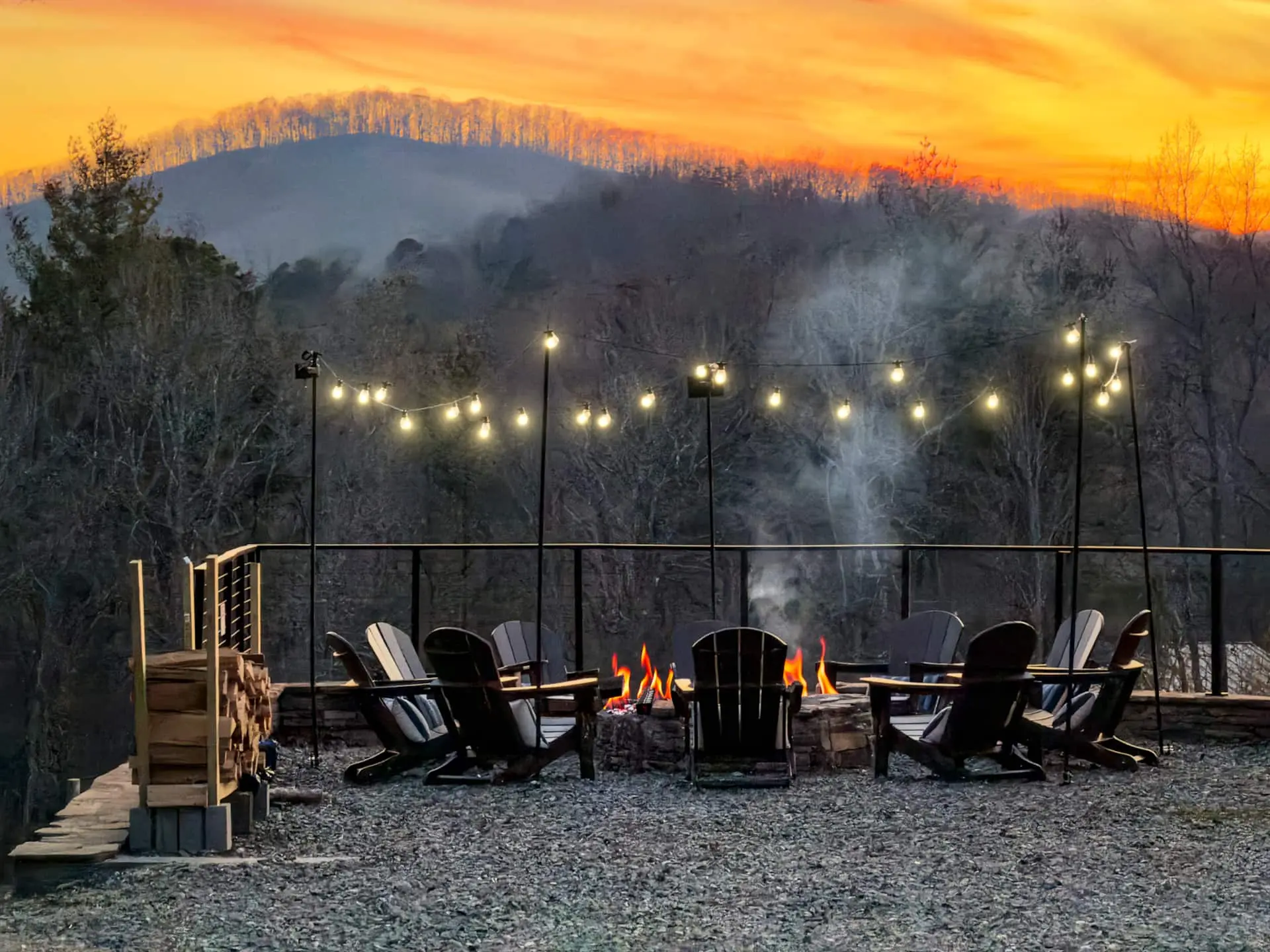 Sunset mountain perch with fire pit, string lights & Adirondack seating
