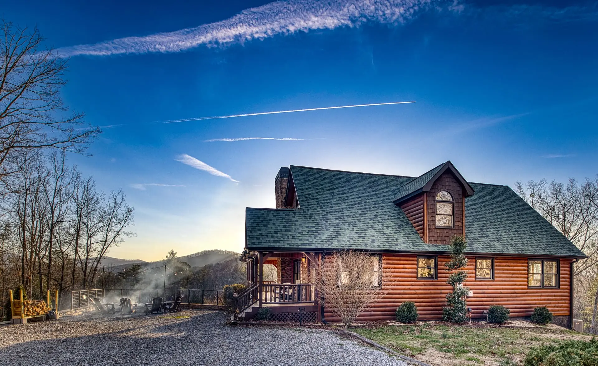 Rustic mountain cabin with sweeping views, cozy porch and fire pit